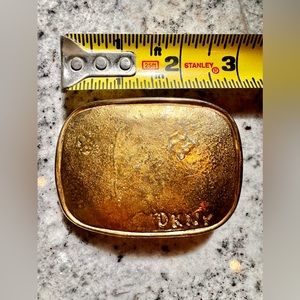DKNY brass belt buckle.